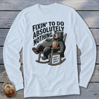 White long-sleeved shirt with a graphic of a bear in a rocking chair, accompanied by humorous text.