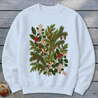 White sweatshirt with a festive winter foliage and berry design.