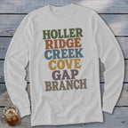 Light gray long-sleeve t-shirt with stacked colorful text reading HOLLER RIDGE CREEK COVE GAP BRANCH.