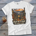 White t-shirt with rocking chairs, pumpkins, and "Pull up a chair, The holler's talkin'" text.