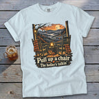 T-shirt with rocking chairs, lanterns, pumpkins, and text "Pull up a chair, The holler's talkin'".