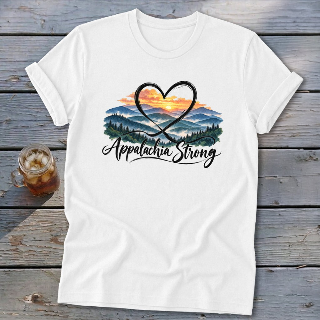 White t-shirt with a heart encircling a mountain sunset and the text "Appalachia Strong".