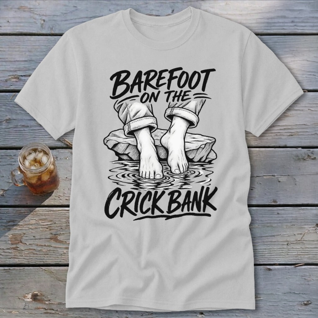 Shirt with "Barefoot on the Crick Bank" text and illustration of bare feet.