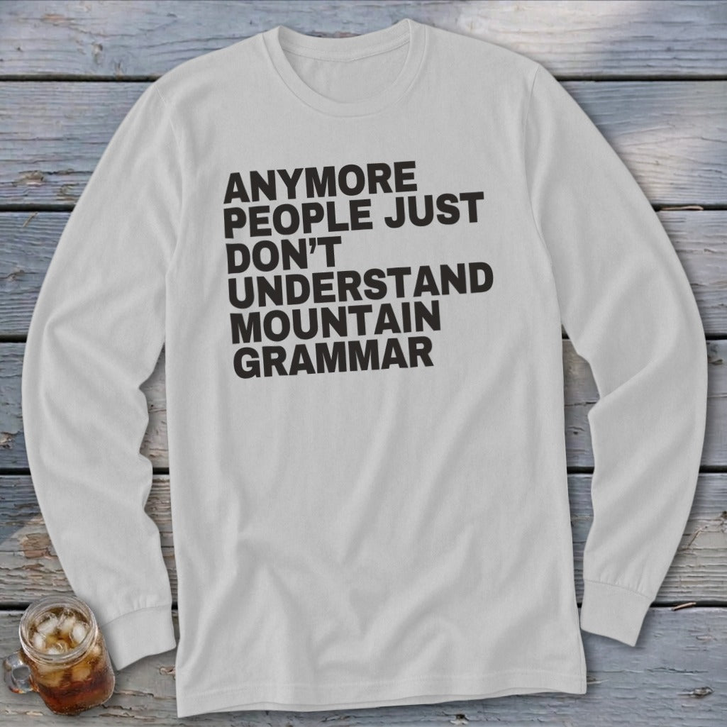 White long-sleeve shirt with black text: "ANYMORE PEOPLE JUST DON'T UNDERSTAND MOUNTAIN GRAMMAR."