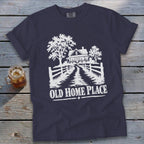 Dark blue t-shirt with white graphic of a farmhouse, trees, and fence. "Old Home Place" text.