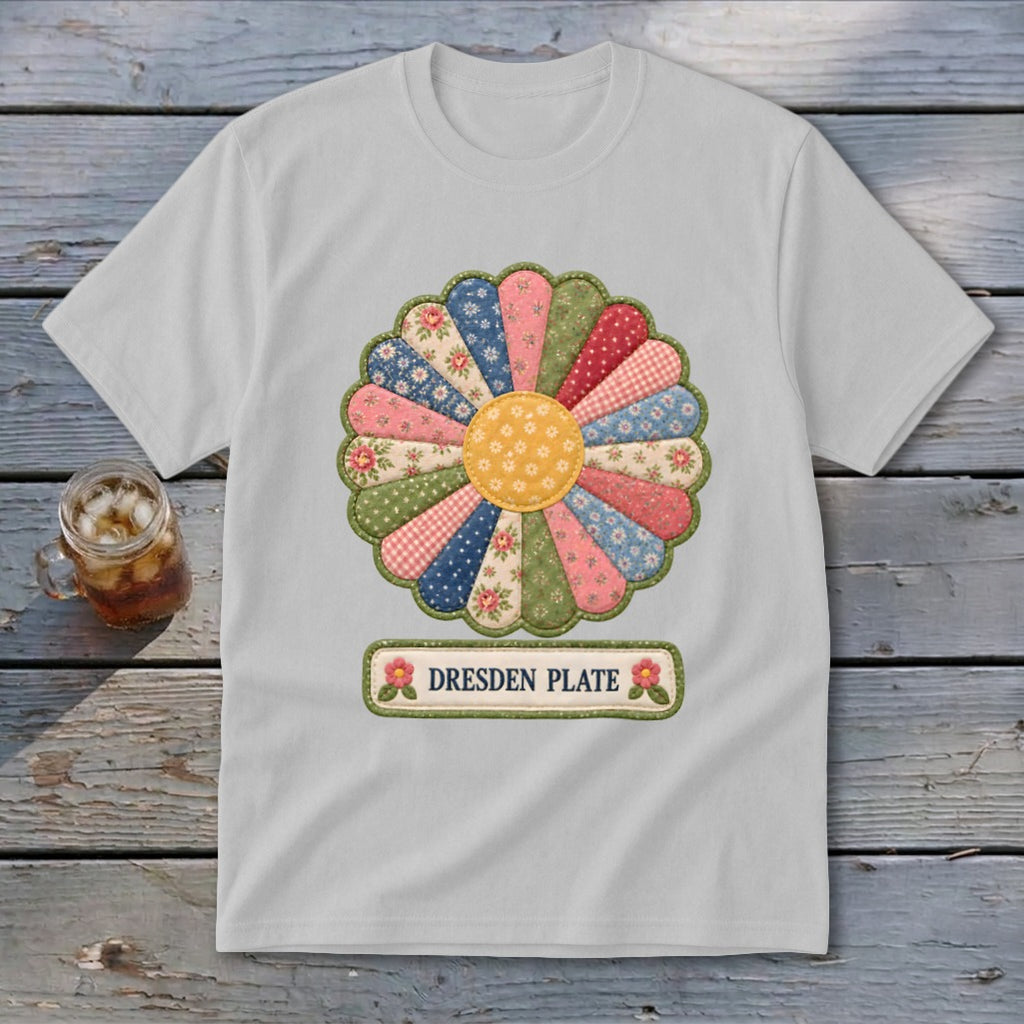 White t-shirt with a colorful Dresden Plate quilt design and text.