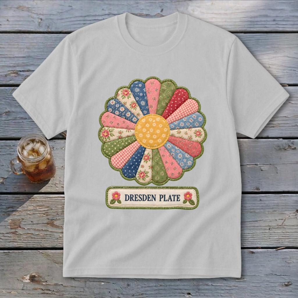 White t-shirt with a colorful Dresden Plate quilt design and text.