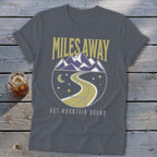 Dark grey t-shirt with "MILES AWAY BUT MOUNTAIN BOUND" and mountain graphic.