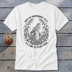 White t-shirt with a black vintage graphic of a bird, corn stalks, and text reading "WHEN THE WHIPPOORWILL CALLS IT'S TIME TO PLANT CORN".