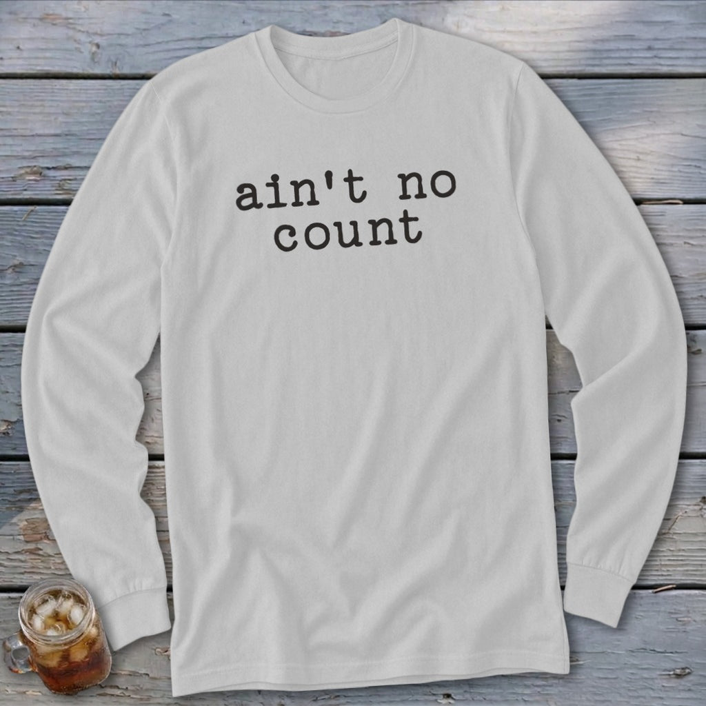 White long-sleeve shirt with "ain't no count" text on chest.