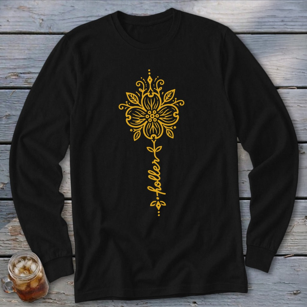 Black long sleeve shirt with yellow floral design and "holler" text.