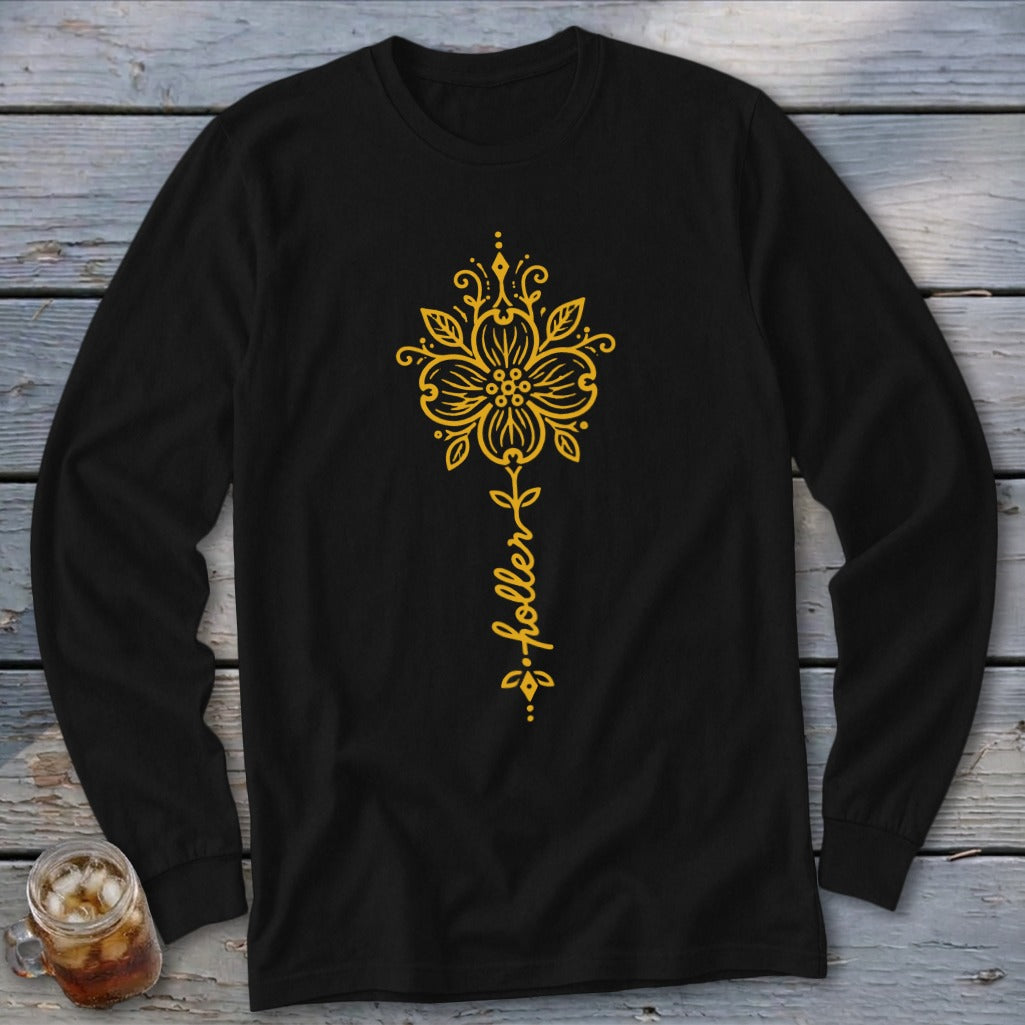 Black long sleeve shirt with yellow floral design and "holler" text.