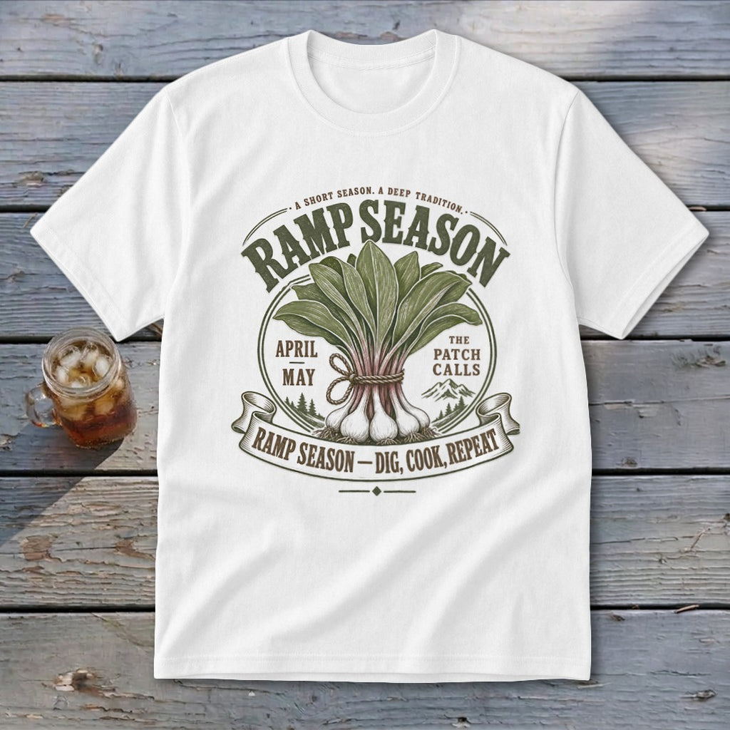 White t-shirt with "Ramp Season" graphic of ramps, text "April May", "The Patch Calls", and "Dig, Cook, Repeat".