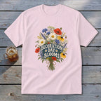 Pink t-shirt with a bouquet of flowers and "Decoration Day Blooms" text.