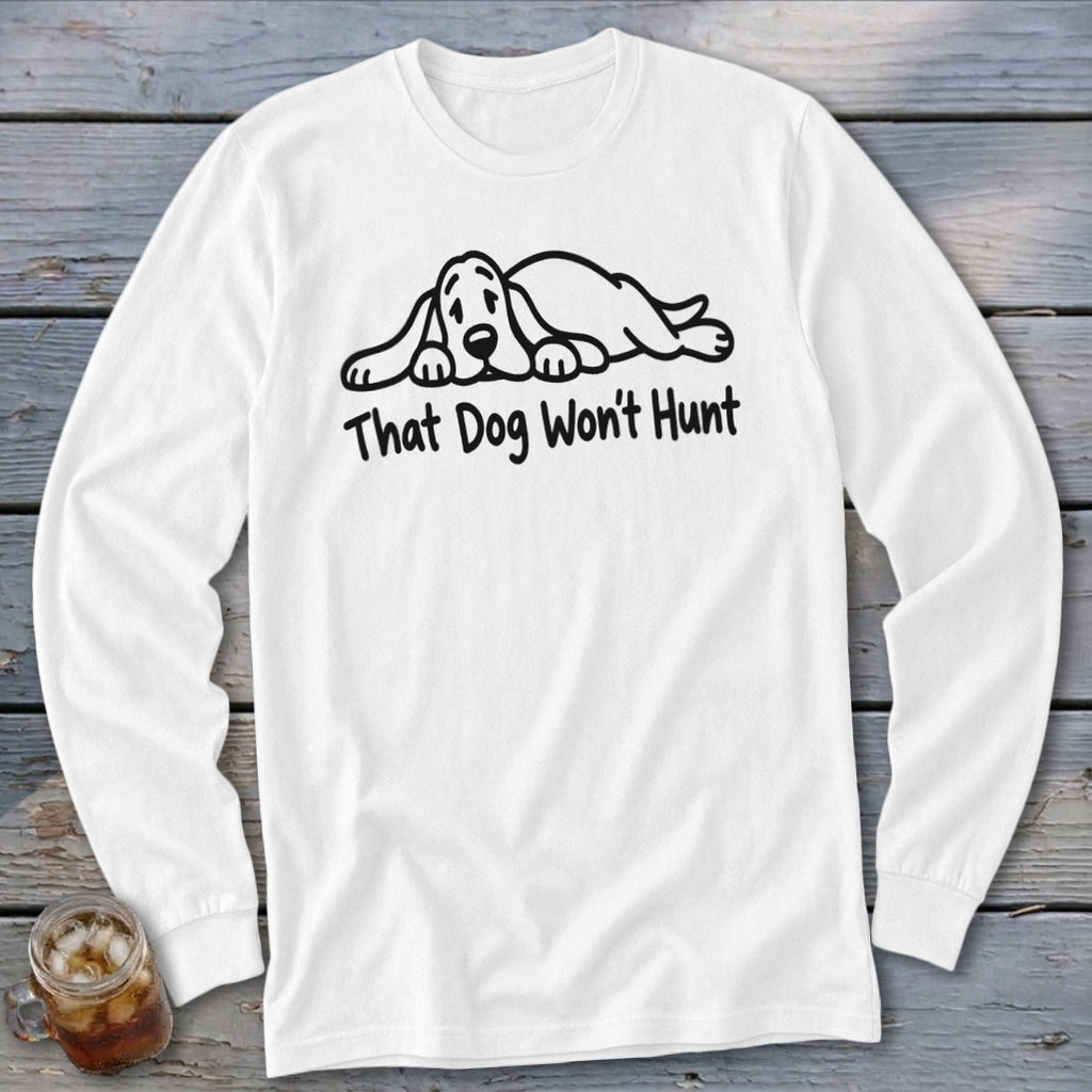 A white long-sleeved t-shirt featuring a black line drawing of a sleeping hound dog and the text "That Dog Won't Hunt."