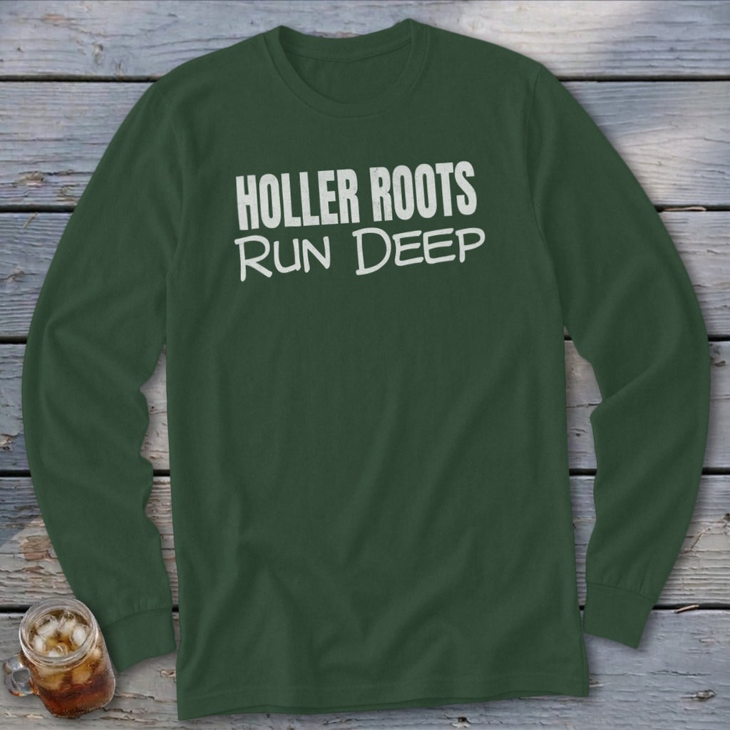 Green long-sleeve shirt with white text "HOLLER ROOTS RUN DEEP".