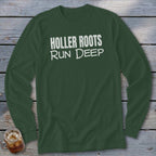 Green long-sleeve shirt with white text "HOLLER ROOTS RUN DEEP".