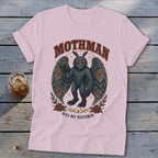 Pink t-shirt with Mothman graphic and text "Mothman Was My Neighbor".