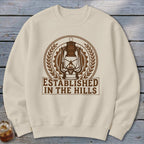Cream sweatshirt with "Established in the Hills" text and a vintage lantern graphic.