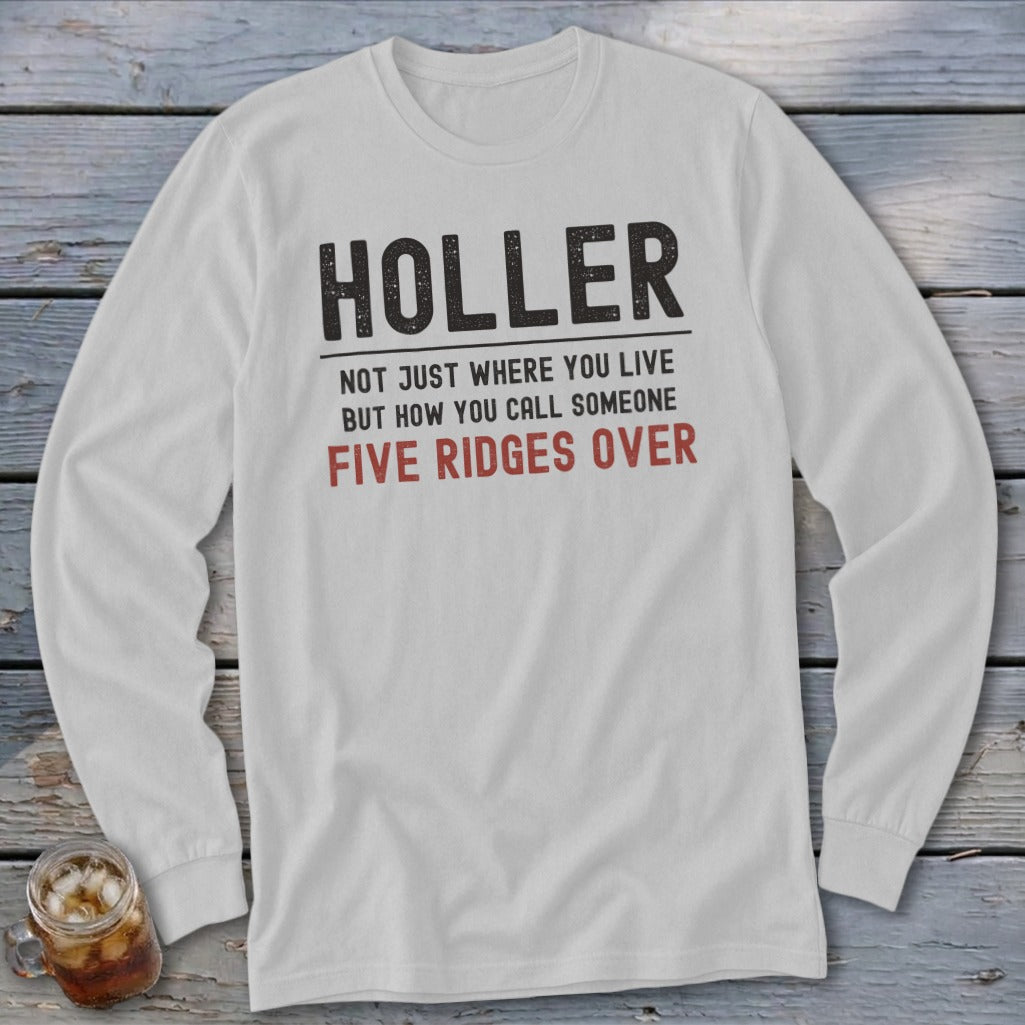 White long sleeve shirt with text: Holler, Not just where you live but how you call someone five ridges over.