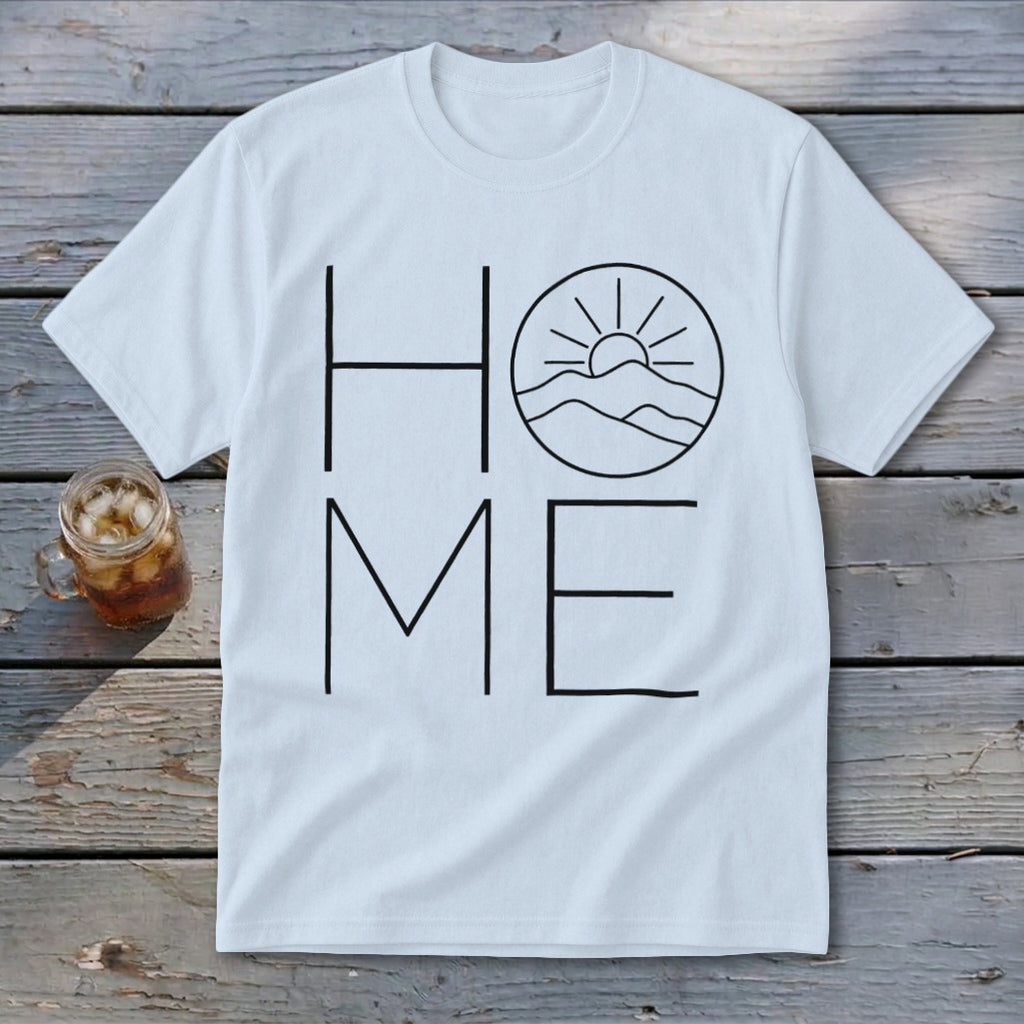 A white t-shirt featuring a black graphic that spells HOME, with a mountain and sun illustration replacing the letter O.