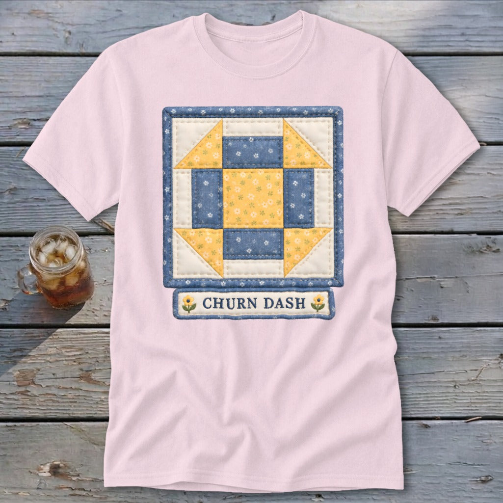 Pink t-shirt with a "Churn Dash" quilt block graphic and text.