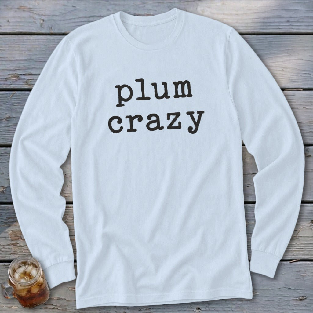Long sleeve white t-shirt with "plum crazy" text in black.