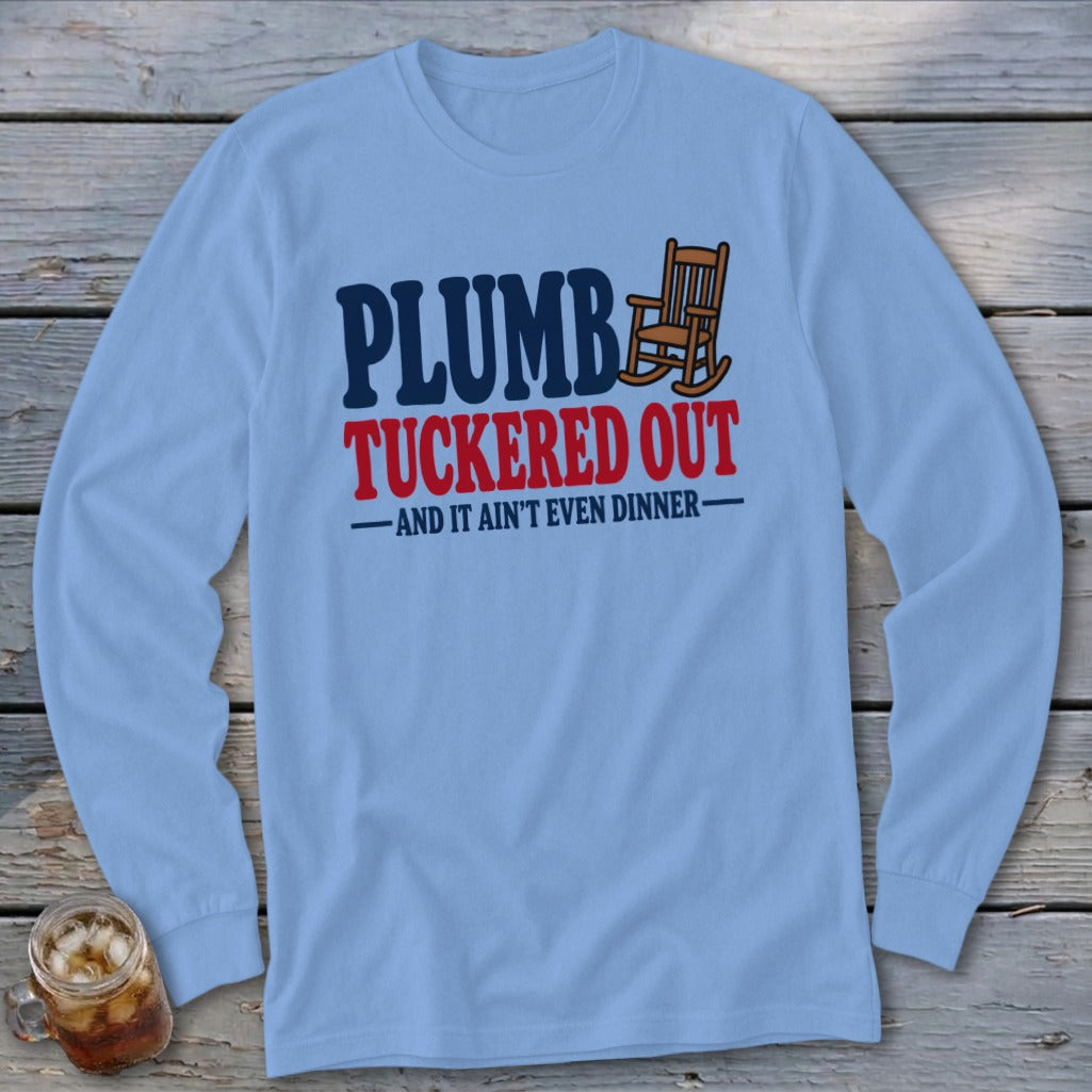 Light blue long sleeve shirt with "PLUMB TUCKERE OUT" and rocking chair graphic.