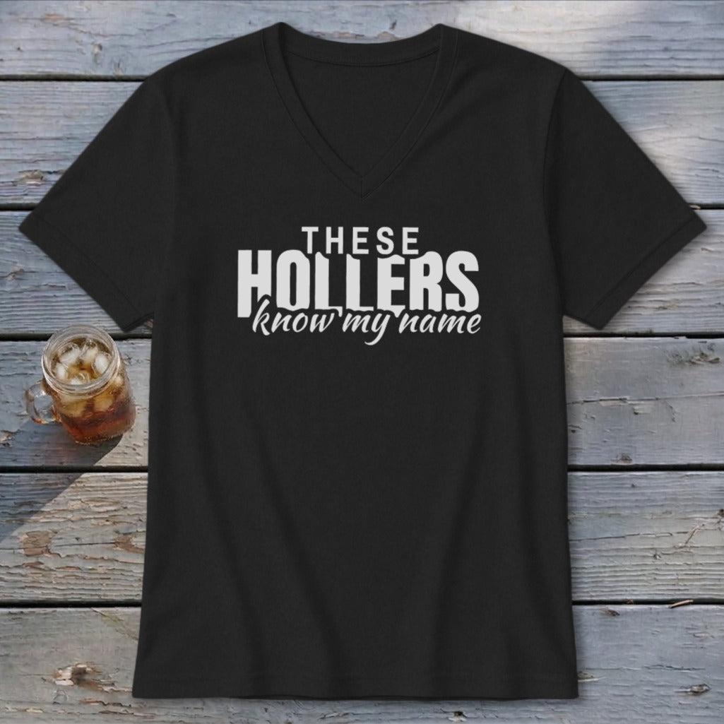 Black v-neck t-shirt with white text "THESE HOLLERS know my name".