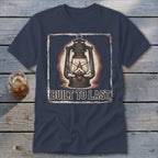 Navy t-shirt with a vintage lantern graphic and text "BUILT TO LAST".