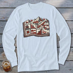 Light blue long-sleeve t-shirt with a red and gray graphic of mountains and patchwork quilt.
