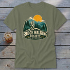 Olive green t-shirt with "Ridge Walking Society" graphic and hiker on a mountain.