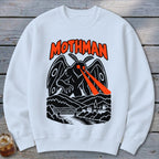 White sweatshirt with black Mothman graphic and orange text above a town and river.
