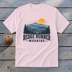 Pink t-shirt with "Ridge Runner Morning" text and mountain sunset graphic.