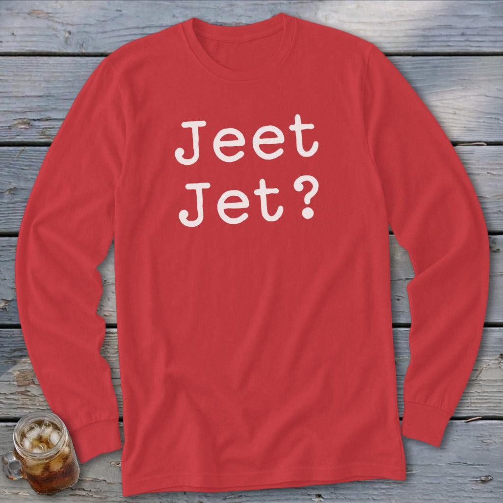 Red long-sleeve shirt with white text "Jeet Jet?".