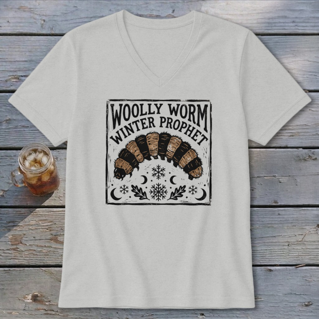 Light gray V-neck t-shirt featuring a black and brown woolly worm graphic with text reading WOOLLY WORM WINTER PROPHET.