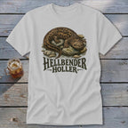 White t-shirt with a hellbender salamander on rocks and "Hellbender Holler" text.