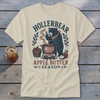 Bear making apple butter with "Hollerbear Apple Butter Season" text.