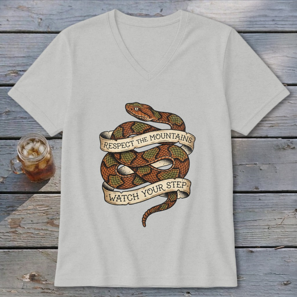 Light grey v-neck t-shirt with coiled snake graphic and text "Respect the Mountains Watch Your Step".
