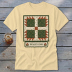 Light yellow t-shirt with a Bear's Paw quilt block design and text.
