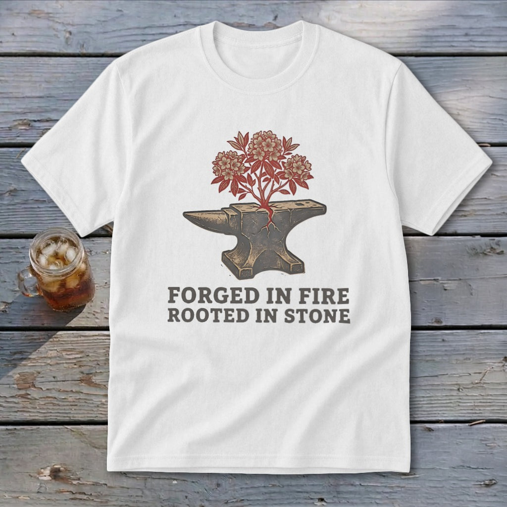 White t-shirt with anvil graphic and text "FORGED IN FIRE ROOTED IN STONE."