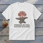 White t-shirt with anvil graphic and text "FORGED IN FIRE ROOTED IN STONE."