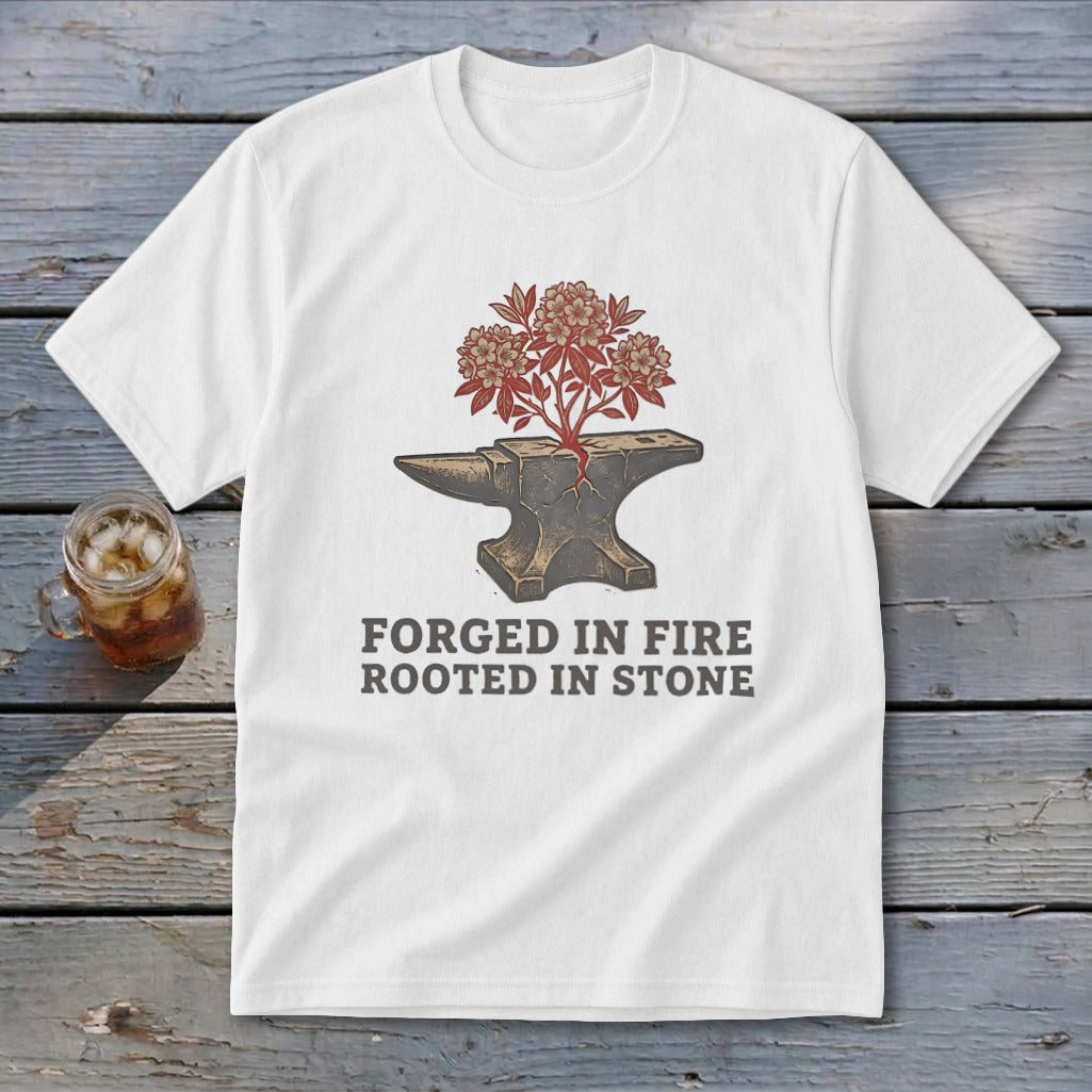 White t-shirt with anvil graphic and text "FORGED IN FIRE ROOTED IN STONE."