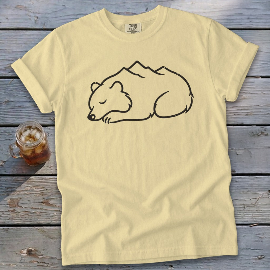 Yellow t-shirt with black outline of sleeping bear and mountains design.