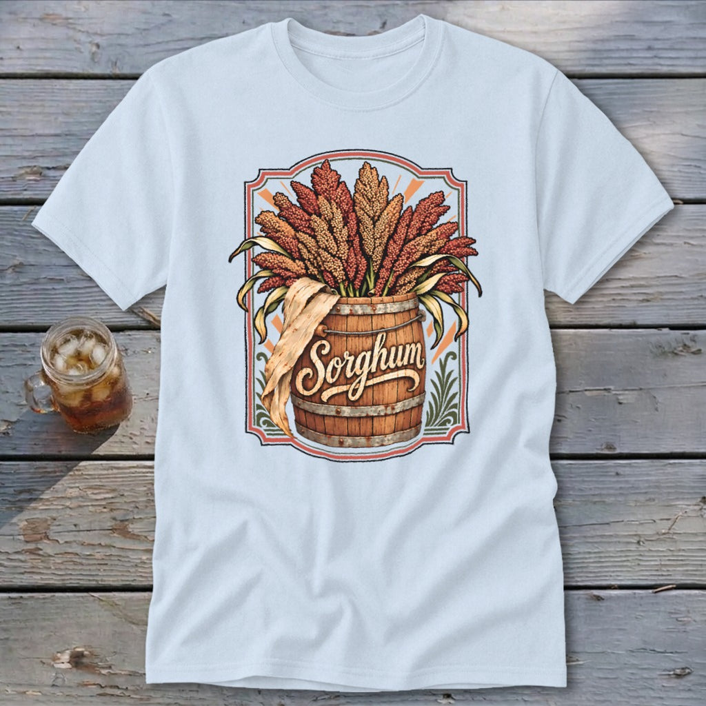 T-shirt features sorghum stalks overflowing from a wooden barrel with the word "Sorghum."
