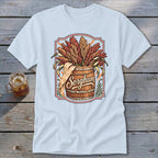 T-shirt features sorghum stalks overflowing from a wooden barrel with the word "Sorghum."
