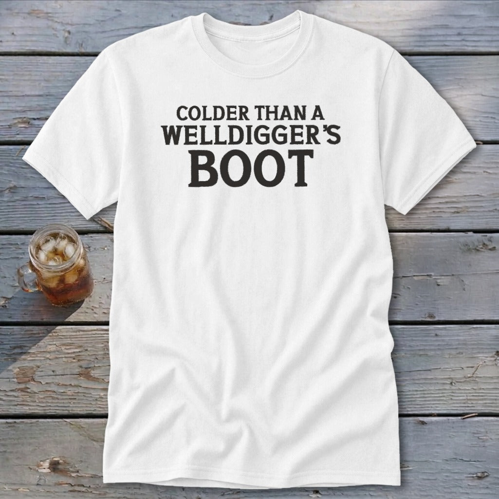 White t-shirt with black text that reads "COLDER THAN A WELLDIGGER'S BOOT".