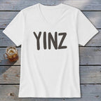 White v-neck t-shirt with "YINZ" in bold gray text