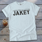 White t-shirt with black text that reads "LOOKING A LITTLE JAKEY".