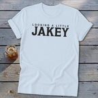 Light blue t-shirt with black text "LOOKING A LITTLE JAKEY".